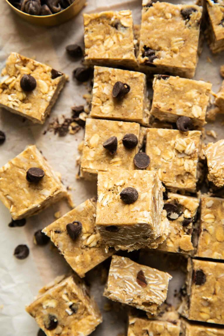 Heavenly hunk squares that are homemade and cut on parchment paper.