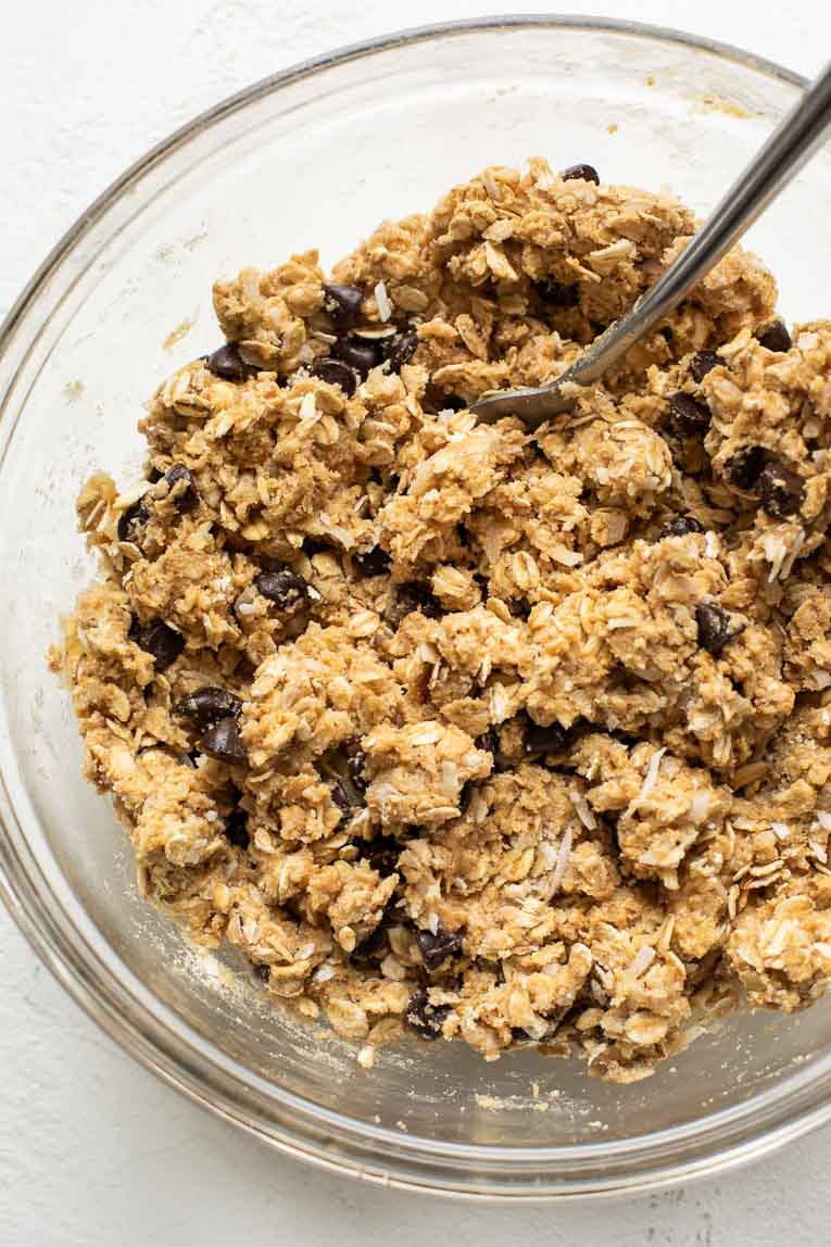 No-bake cookie dough being mixed in a mixing bowl.