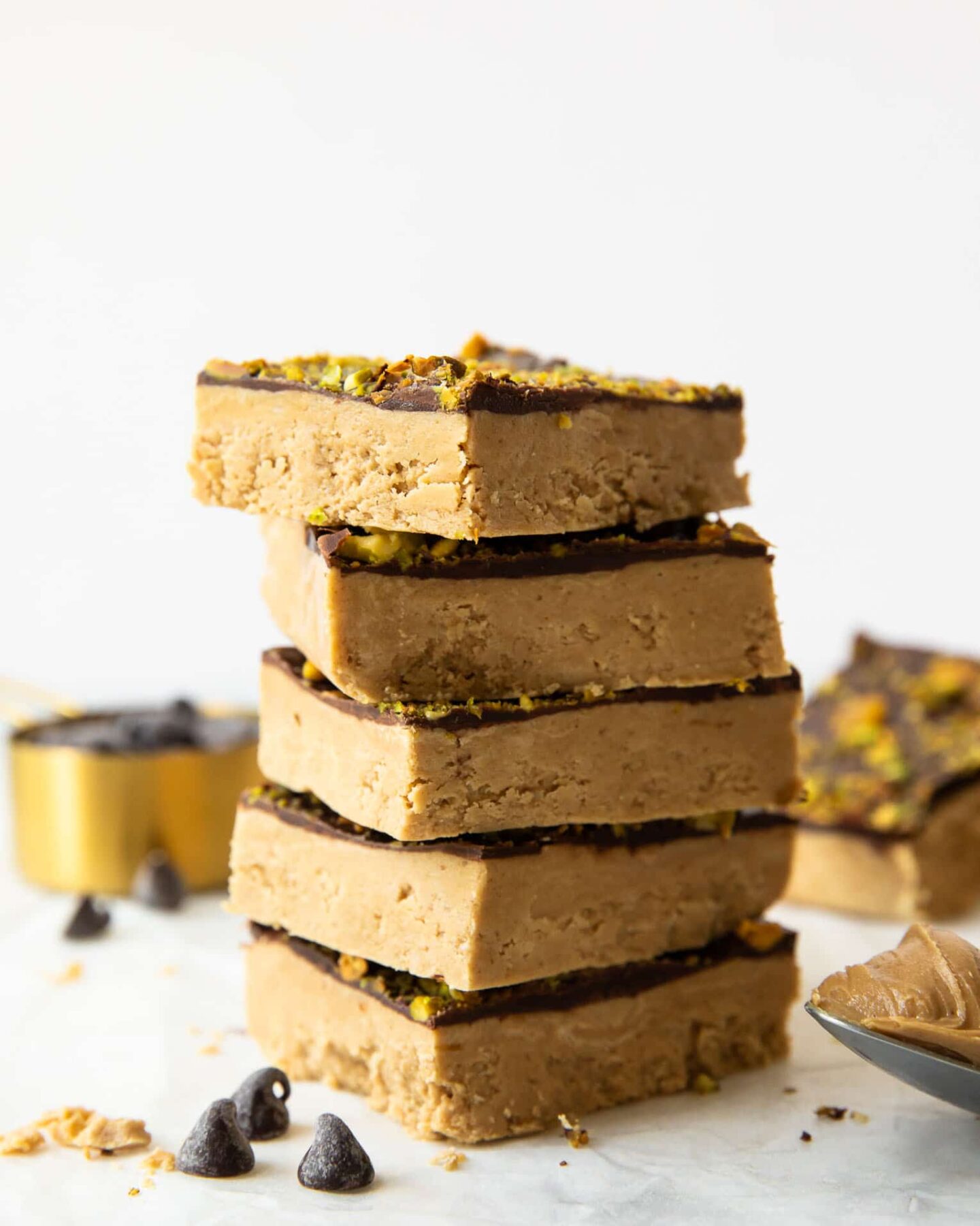 Homemade Protein Bars with peanut butter stacked on top of each other.