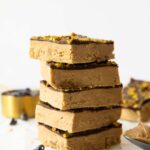 Homemade Protein Bars with peanut butter stacked on top of each other.