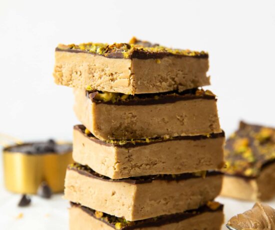 Homemade Protein Bars with peanut butter stacked on top of each other.