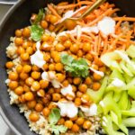 Top shot of Hot Honey Chickpeas in a bowl with celery and carrots.