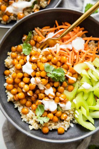 Top shot of Hot Honey Chickpeas in a bowl with celery and carrots.