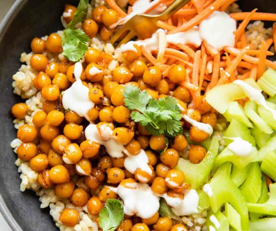 Top shot of Hot Honey Chickpeas in a bowl with celery and carrots.