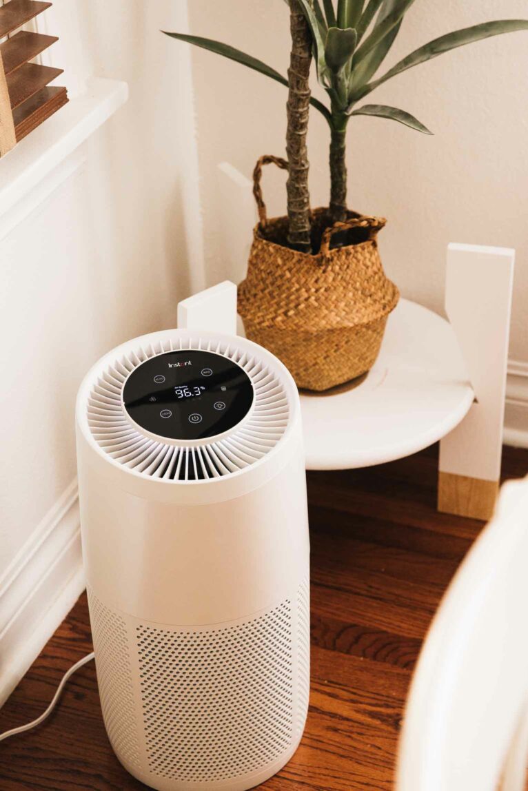 Angled shot of Instant Air Purifier in dining room.