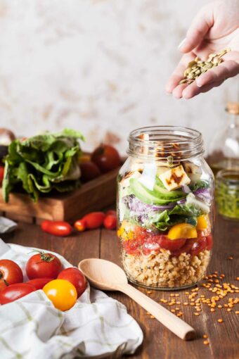 Batch cooking with ingredients and making a salad in a jar.