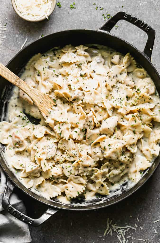One-Pan Skinny Chicken Alfredo in a skillet.