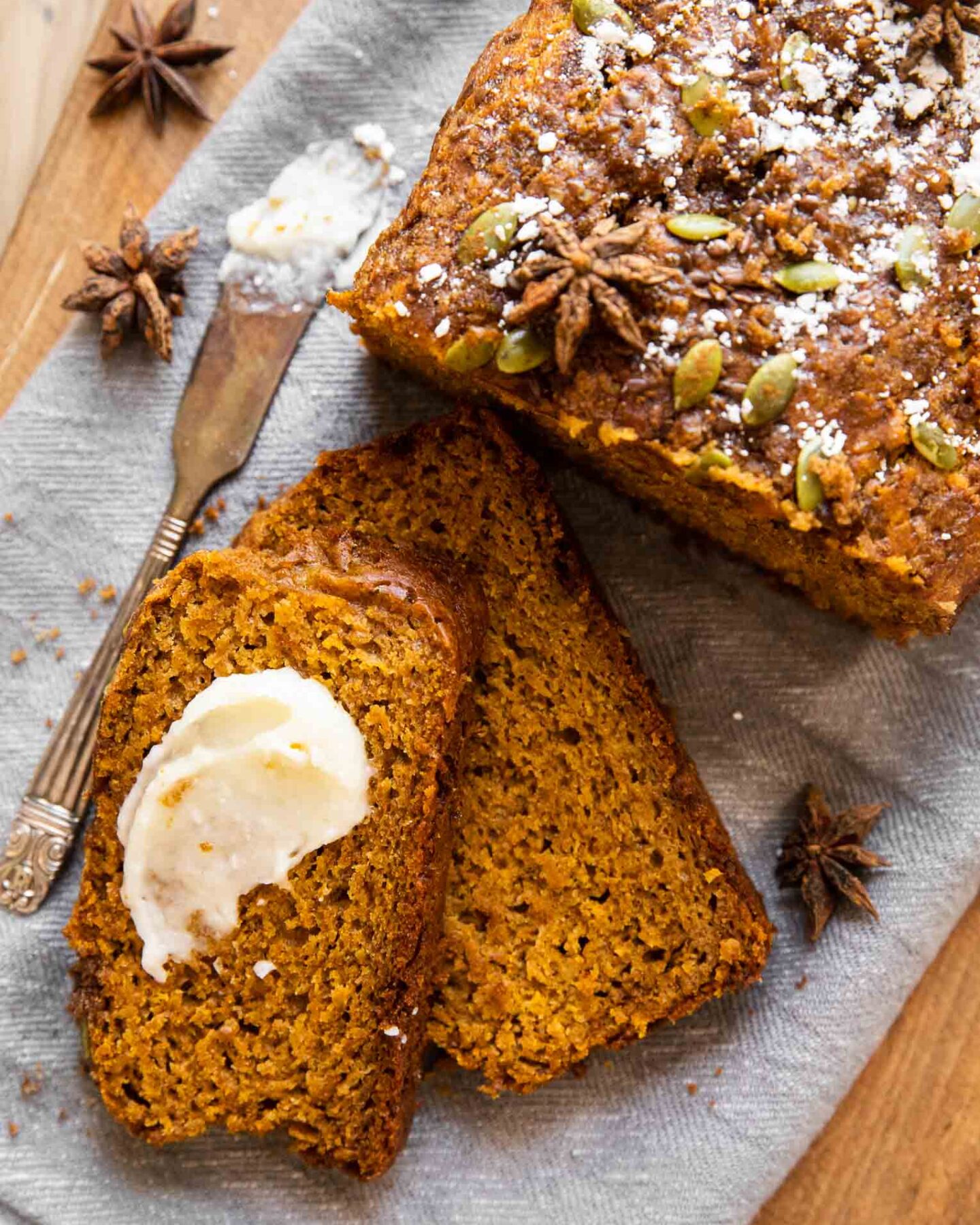 Top shot of healthy pumpkin bread with butter.