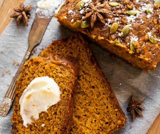 Top shot of healthy pumpkin bread with butter.