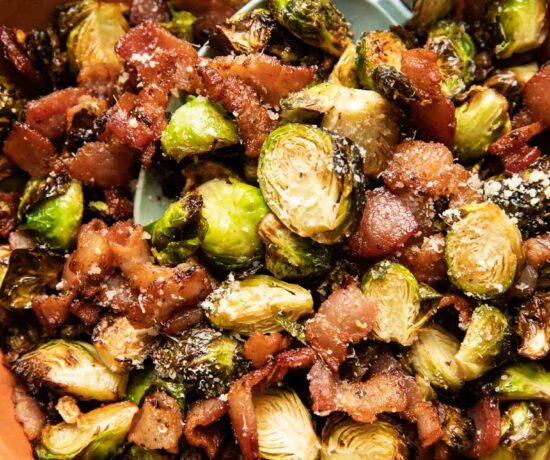 Air fryer brussels sprouts and bacon with parmesan in a bowl.