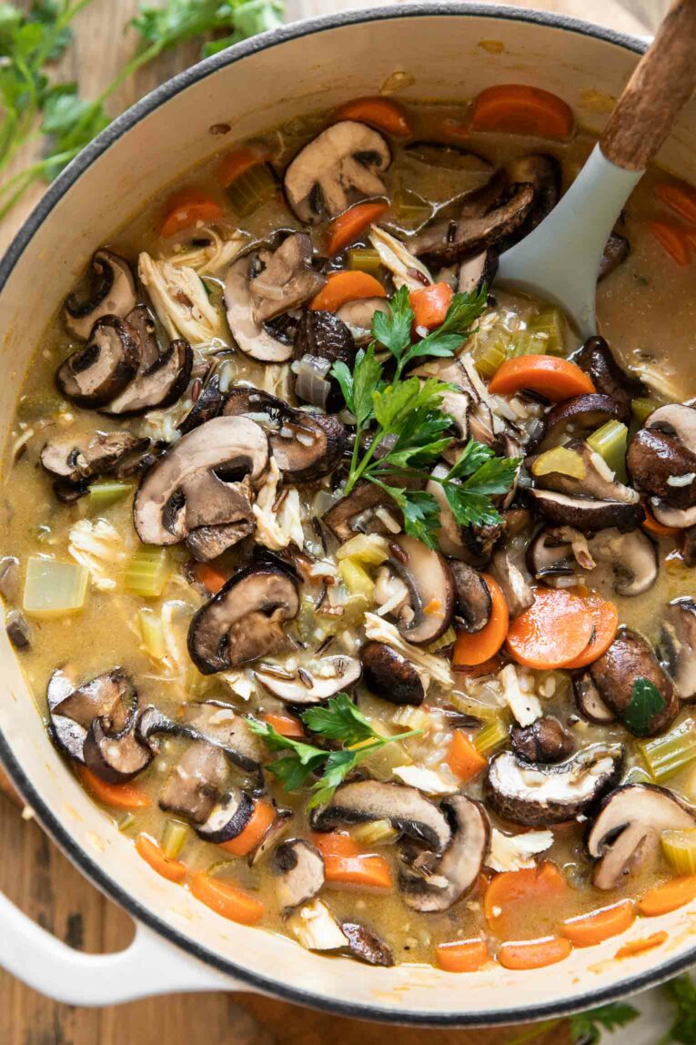 Close up of Creamy Turkey Wild Rice Soup in a large dutch oven.