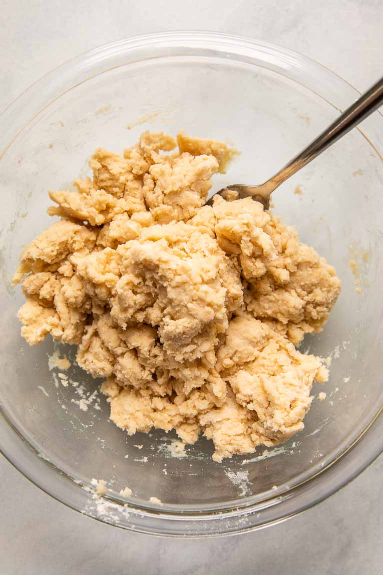 Vegan pie dough being mixed together.
