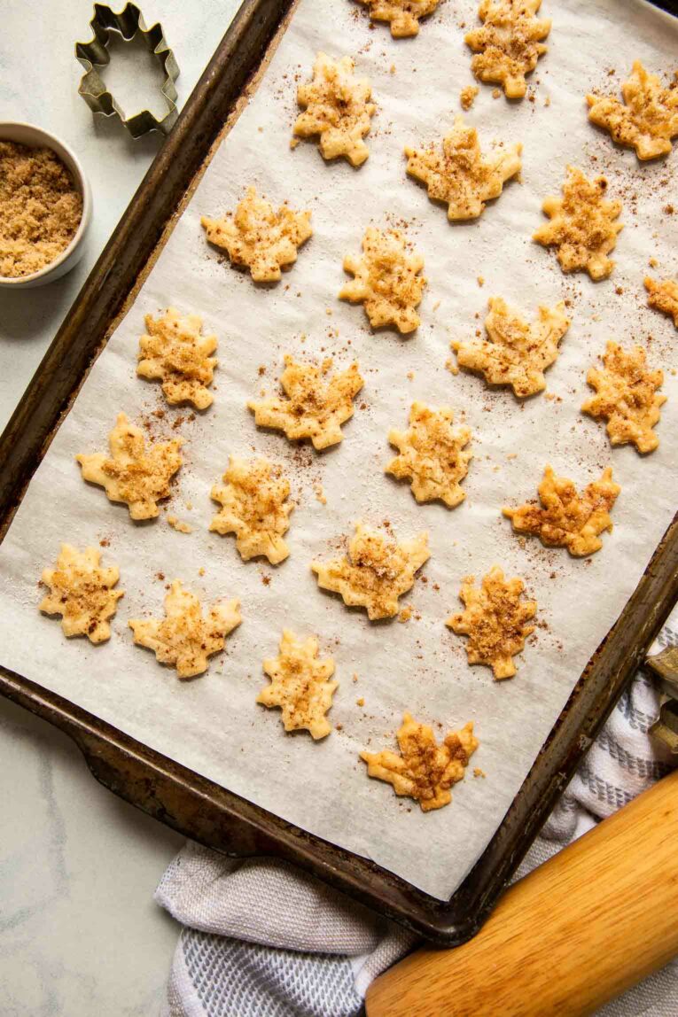 Pie crust cookies topped with butter, cinnamon, and sugar.