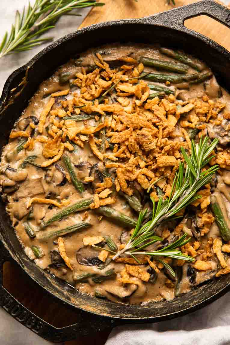 Freshly baked vegan green bean casserole in a skillet.