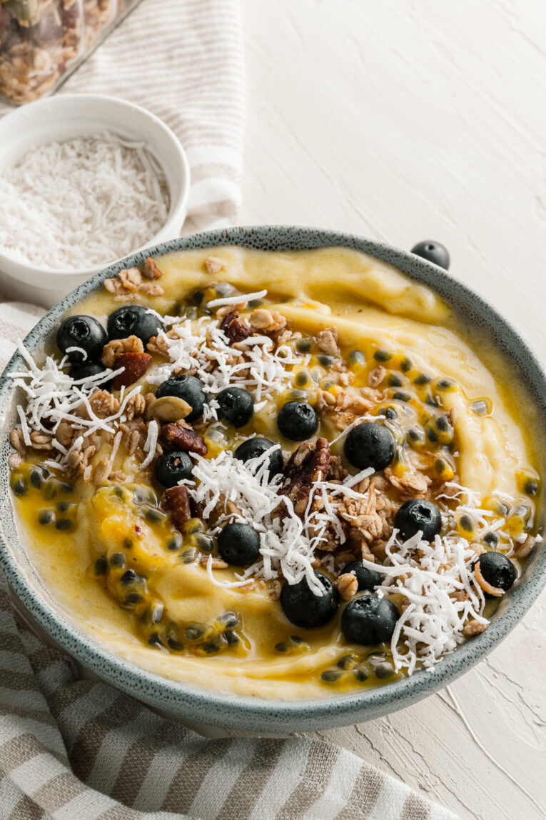 Angled photo of Mango Banana Smoothie Bowl.
