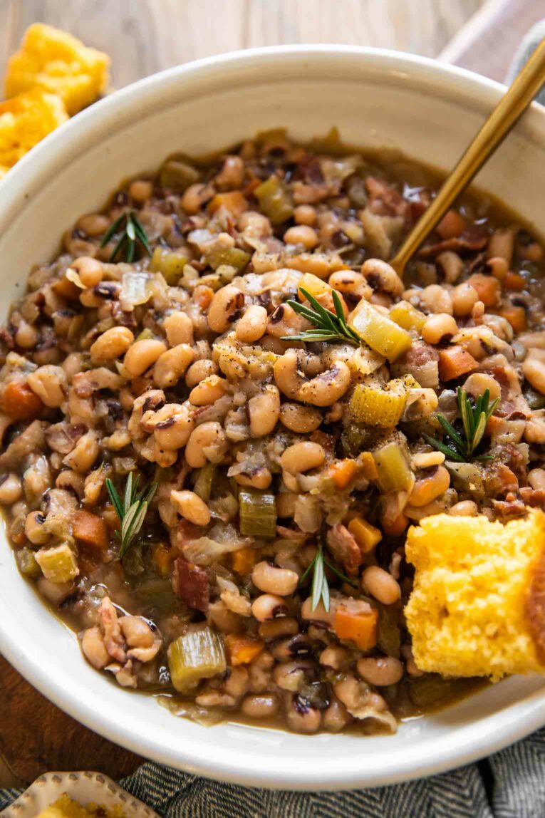 Angled photo of Instant Pot Black Eyed Peas with cornbread.