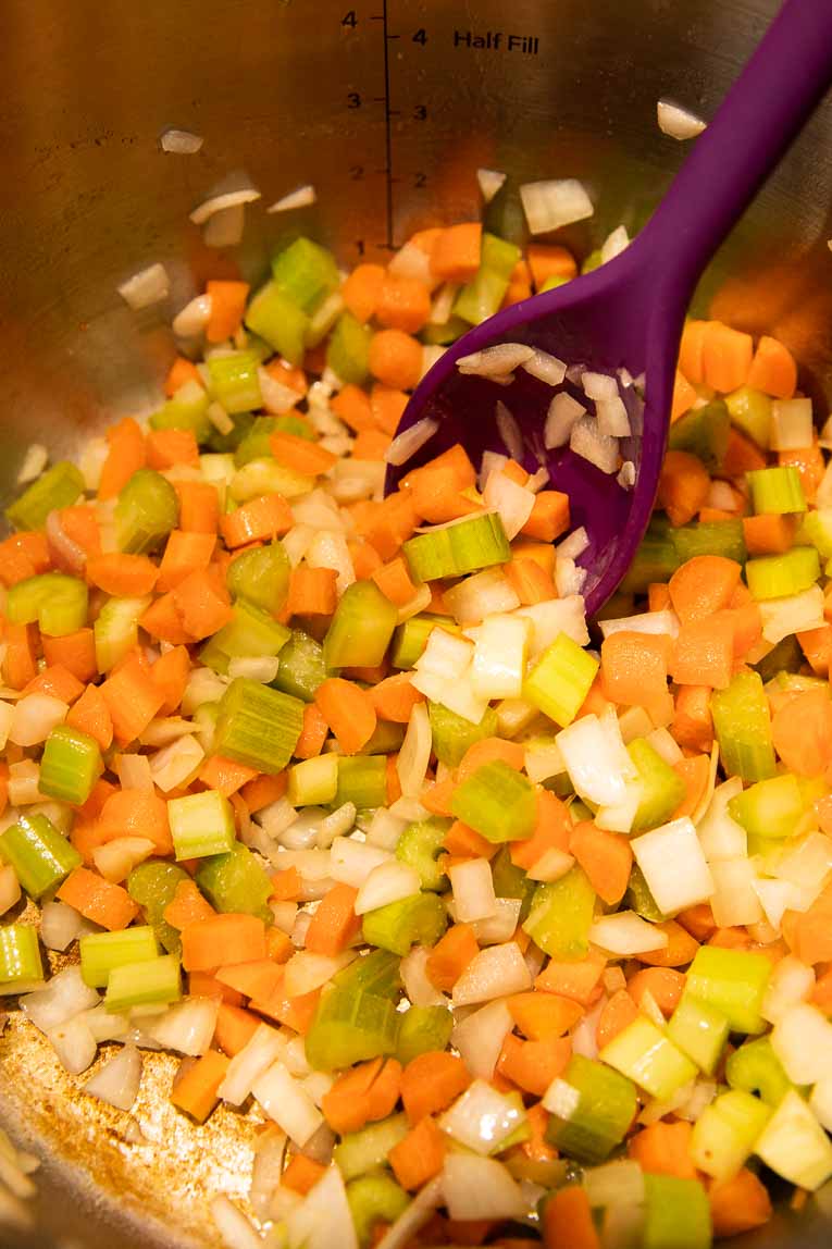 Carrots and celery being cooked in an Instant Pot.