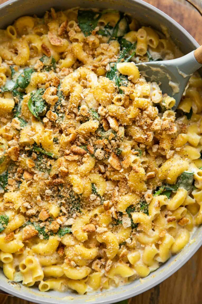 Close up of mac and cheese made with spinach and ricotta.