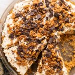 Vegan Butterfinger Cheesecake with slices taken out.