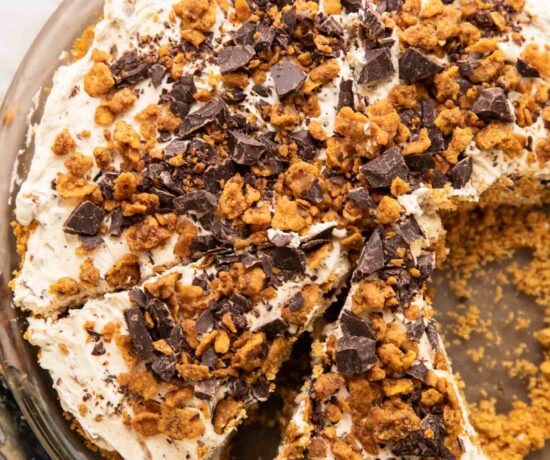 Vegan Butterfinger Cheesecake with slices taken out.