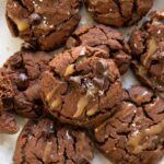 Close up of Vegan Salted Caramel Chocolate Cookies on a plate.