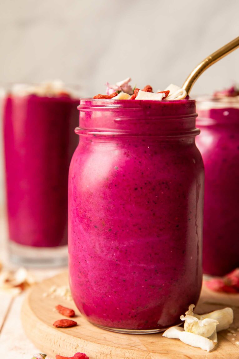 Across photo of dragon fruit goji berry smoothie.