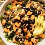 Top shot of sweet potato black bean quinoa salad with avocado.