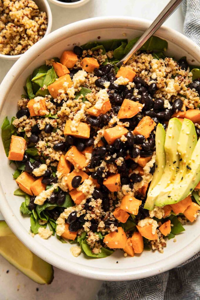 Top shot of sweet potato black bean quinoa salad with avocado.