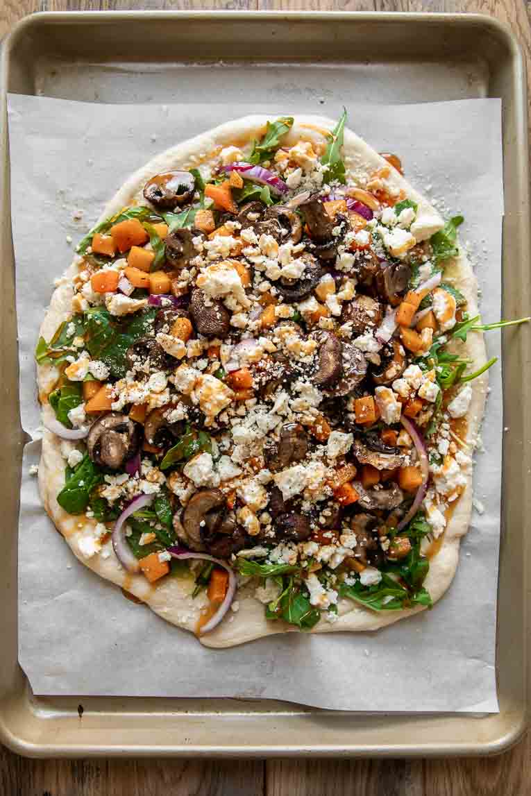 Hot honey pizza dough with vegetarian toppings.