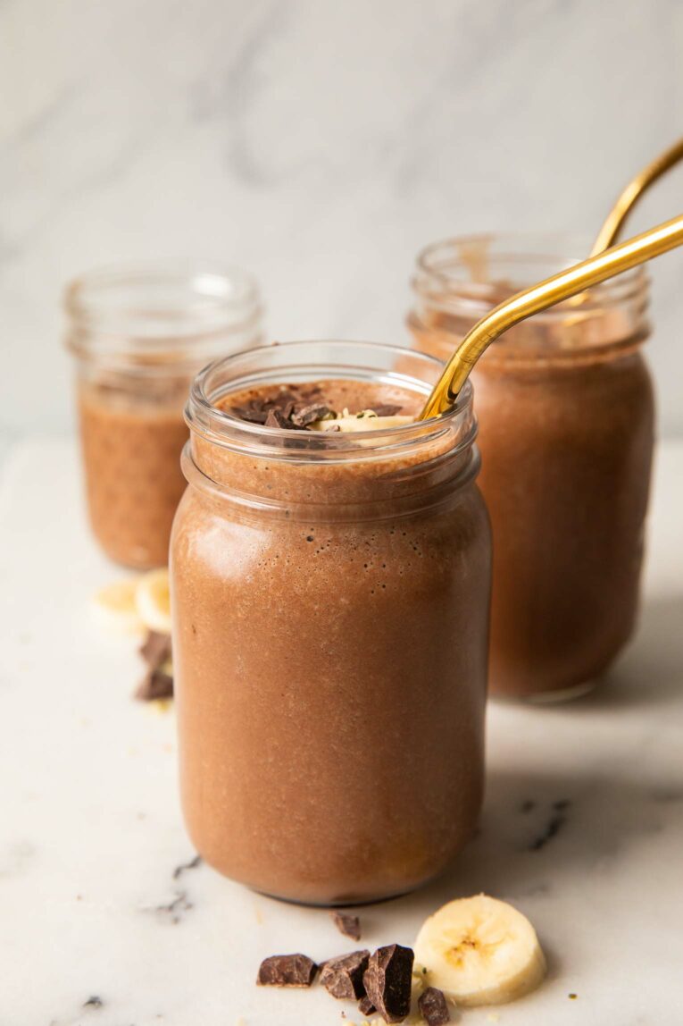 Angled photo of chocolate banana smoothies.