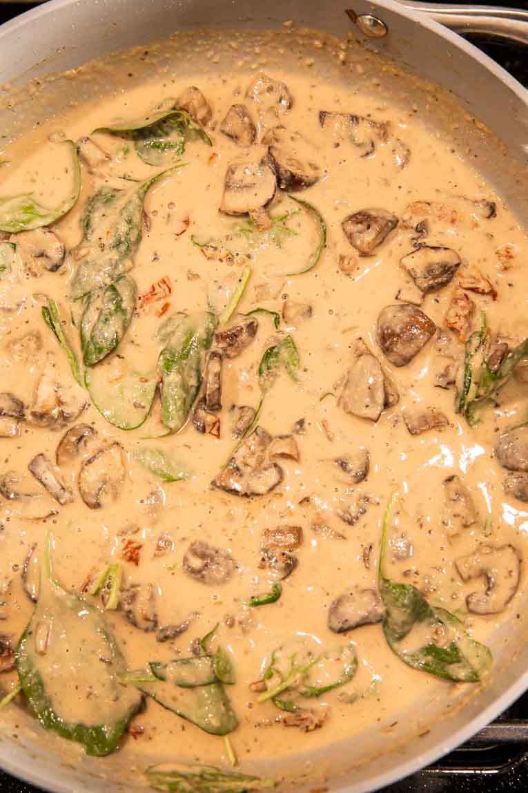 Mushrooms and spinach in a dairy free sauce.