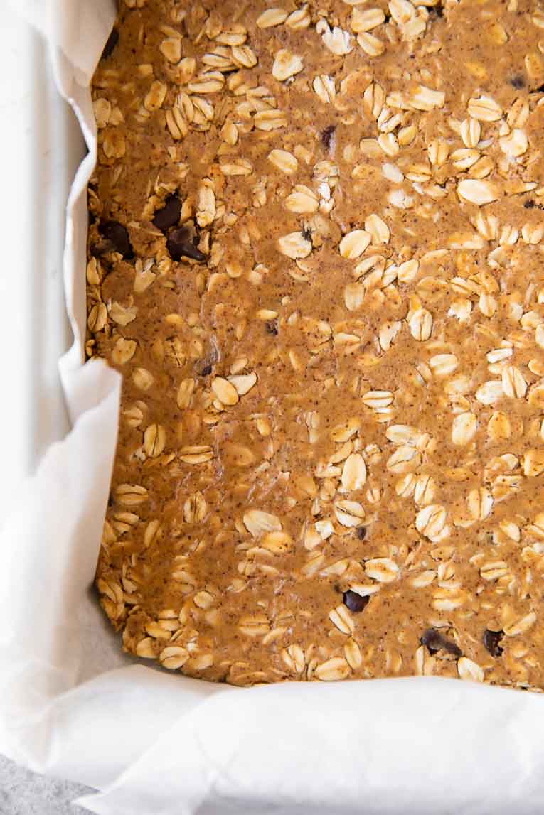 Protein bar mixture in a baking pan.