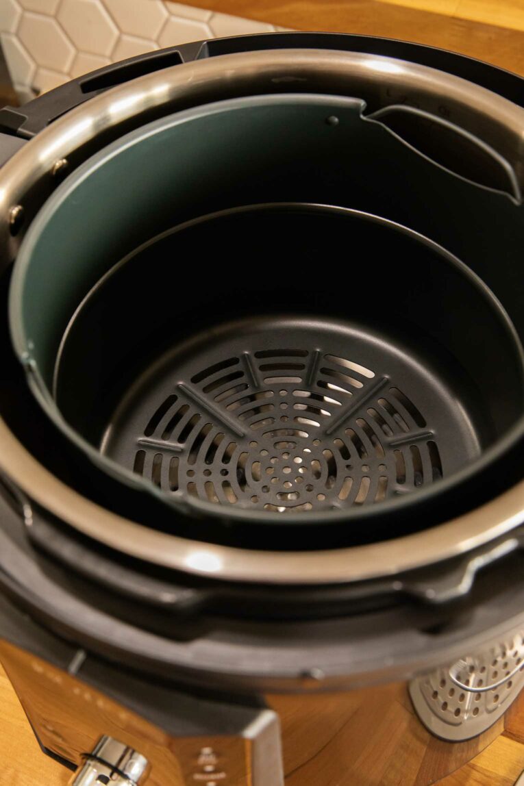 Air fryer basket inside Instant Pot inner pot.