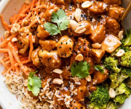 Top photo of peanut butter chicken recipe in a large bowl.