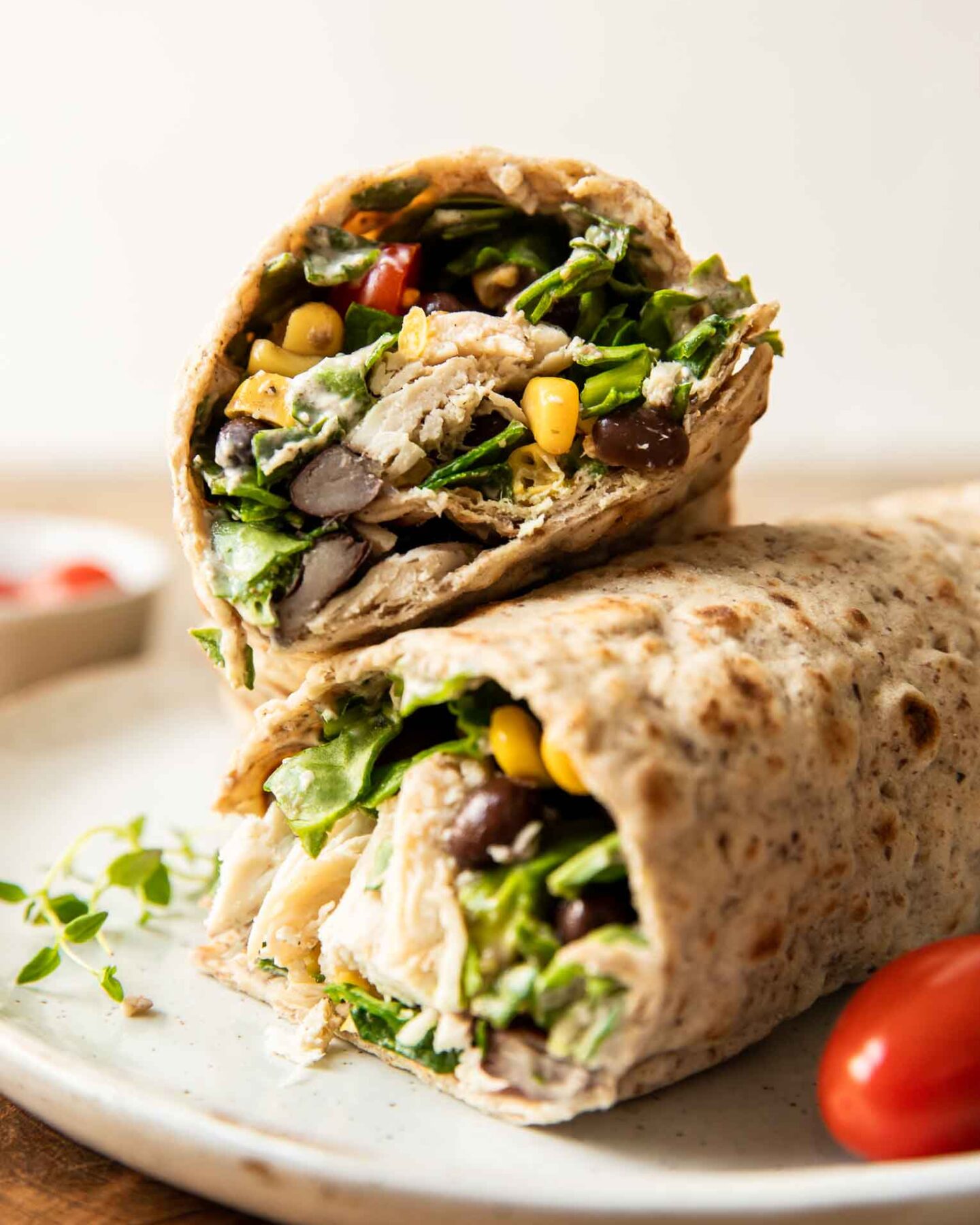 Close up of Fiesta Ranch Chicken Wraps stacked on each other.