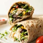 Close up of Fiesta Ranch Chicken Wraps stacked on each other.