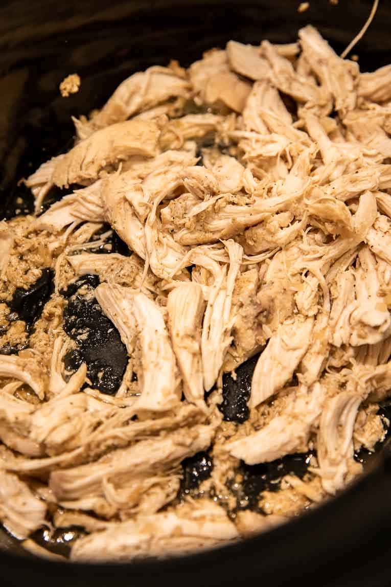 Shredded ranch chicken in a slow cooker.