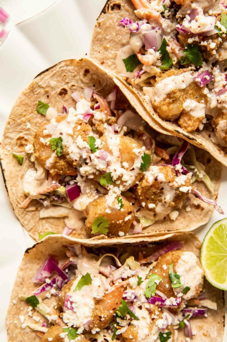 Baja Shrimp Tacos on a white background.