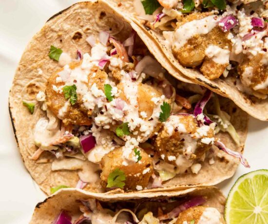 Baja Shrimp Tacos Recipe with cabbage coleslaw and lime.
