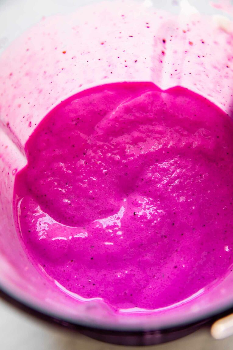 Dragon fruit smoothie in a blender.