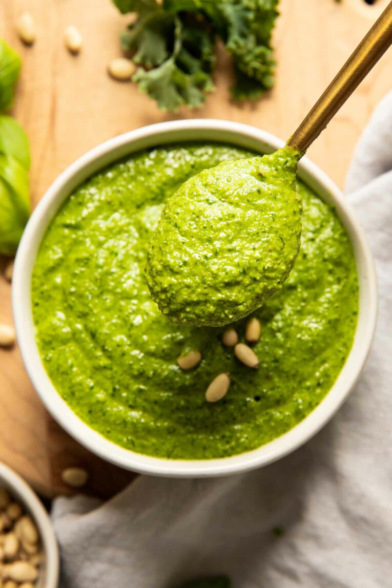Spoon with kale pesto recipe.