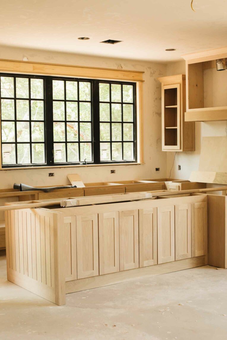 New build house kitchen black grid windows.
