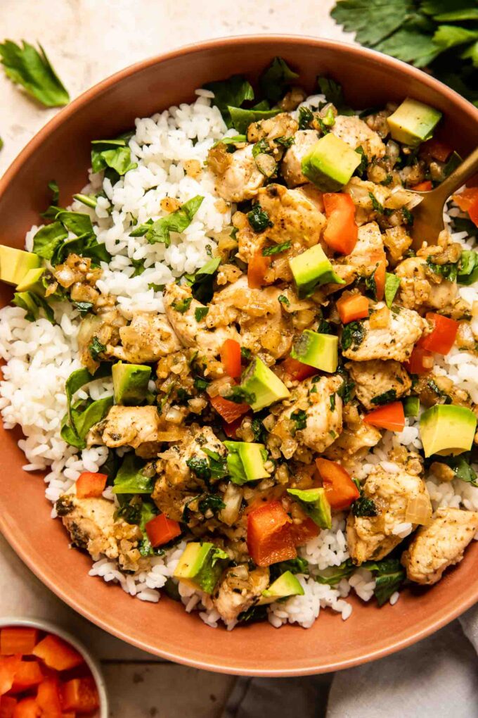Chimichurri Chicken Bowls recipe with fresh parsley and peppers.
