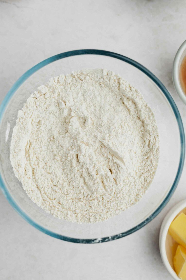 Dry ingredients in a bowl being mixed together.