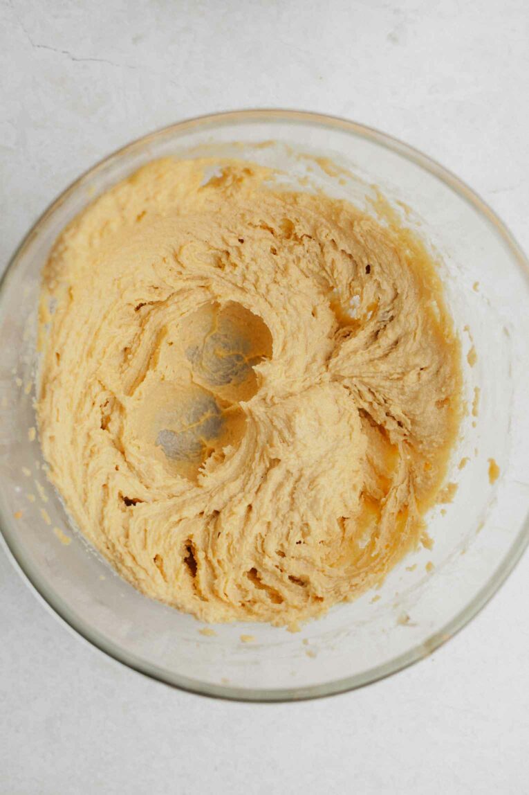 Liquid ingredients for vegan cookie bars in a bowl.