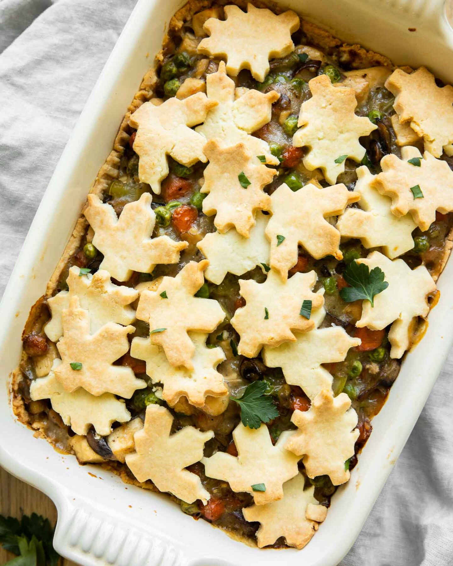 Gluten free chicken pot pie casserole recipe with pie crust shapes.