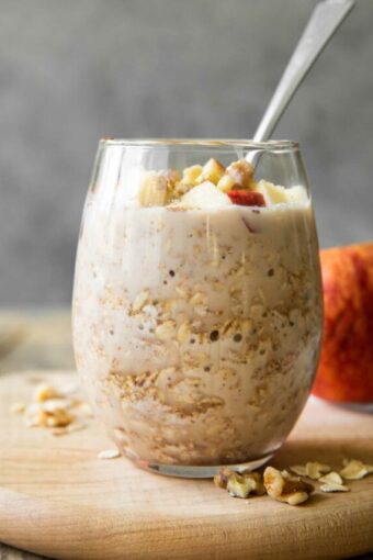 Apple Pie Overnight Oats in a glass cup.