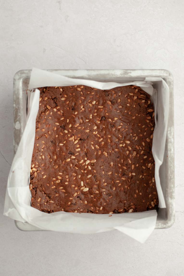 Protein bar dough in a baking pan.