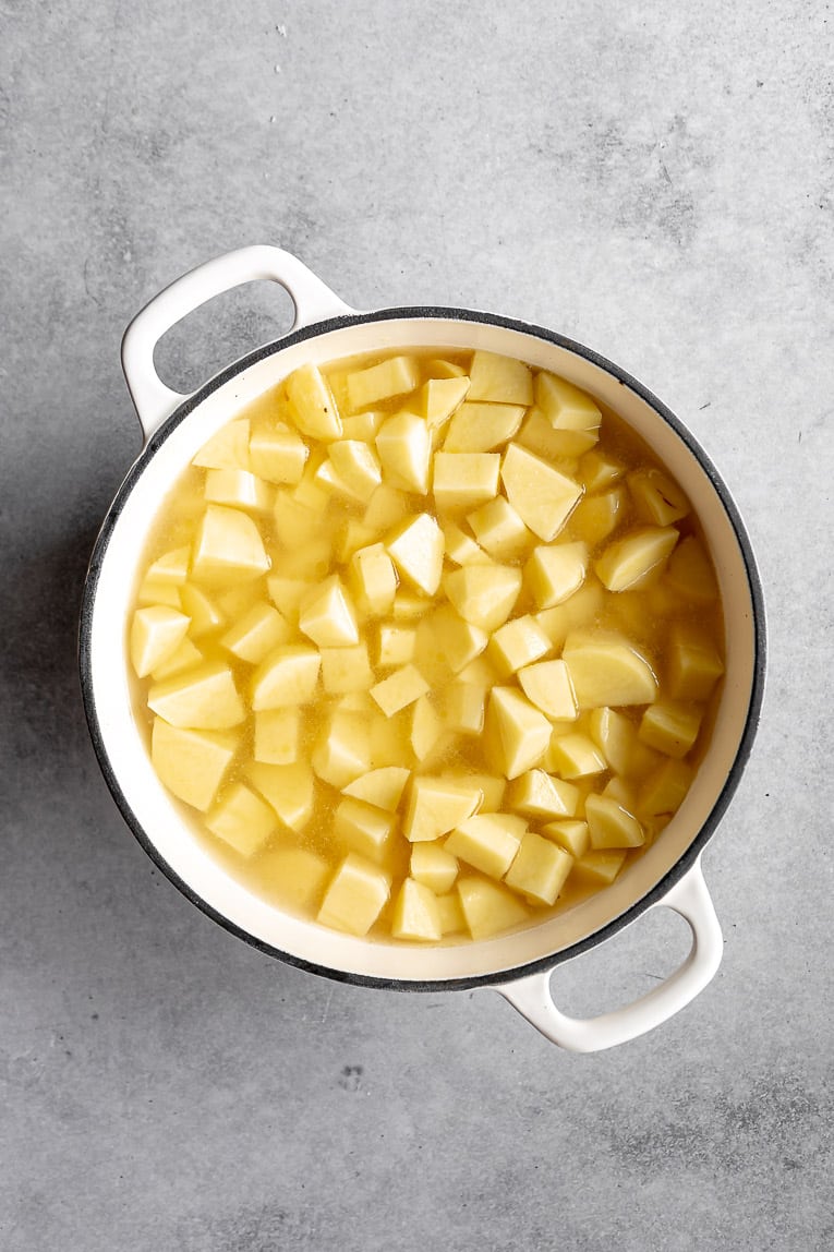 Potatoes simmering in dutch oven.