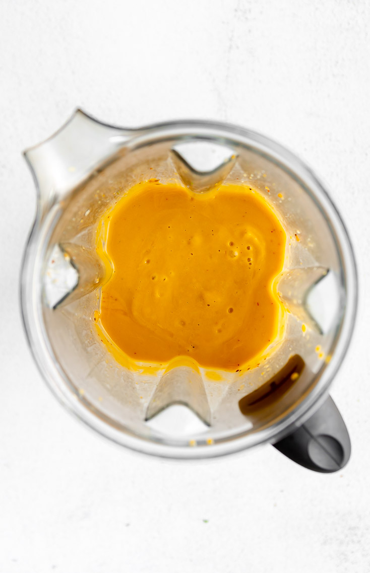Butternut squash sauce being blended for gnocchi.